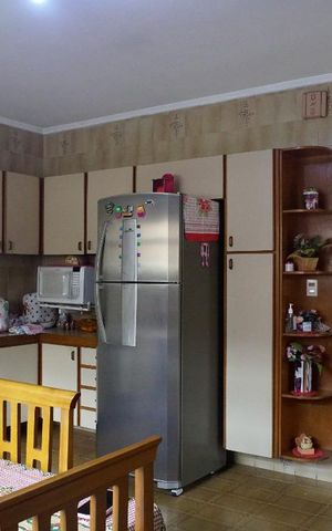 Casa à venda com 177m², 3 quartos e 2 vagas Casa à venda com 177m², 3 quartos e 2 vagasCozinha