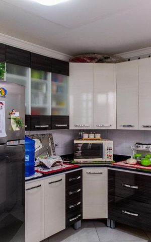 Casa à venda com 96m², 3 quartos e 2 vagas Casa à venda com 96m², 3 quartos e 2 vagasCozinha