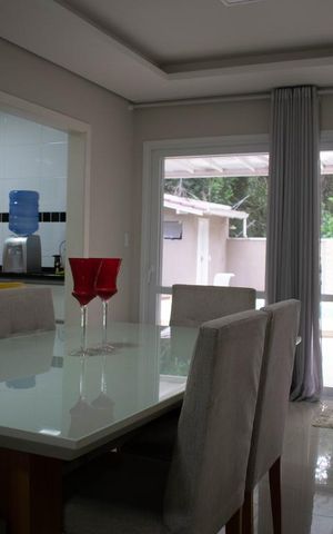 Casa de condomínio à venda com 213m², 4 quartos e 4 vagasSala de Estar