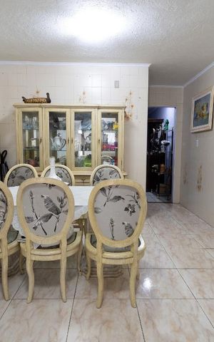 Casa à venda com 150m², 2 quartos e 2 vagas Casa à venda com 150m², 2 quartos e 2 vagasCozinha