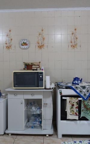 Casa à venda com 150m², 2 quartos e 2 vagas Casa à venda com 150m², 2 quartos e 2 vagasCozinha