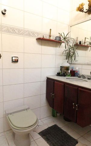 Casa à venda com 400m², 6 quartos e 4 vagassuíte 2