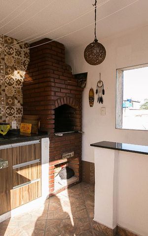 Casa à venda com 180m², 3 quartos e 2 vagasárea com Churrasqueira