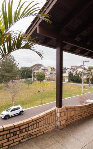 Casa à venda com 475m², 4 quartos e 5 vagas Casa à venda com 475m², 4 quartos e 5 vagasVista da Sacada