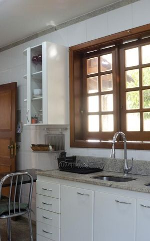 Casa à venda com 450m², 4 quartos e 4 vagas Casa à venda com 450m², 4 quartos e 4 vagasCozinha