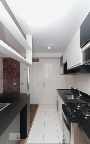 Studio à venda com 28m², 1 quarto e 1 vaga Studio à venda com 28m², 1 quarto e 1 vagaCozinha e Área de Serviço