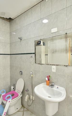 Casa à venda com 260m², 7 quartos e 4 vagasBanheiro da suite
