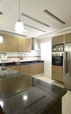 Casa à venda com 260m², 7 quartos e 4 vagasSala 2 e cozinha americana