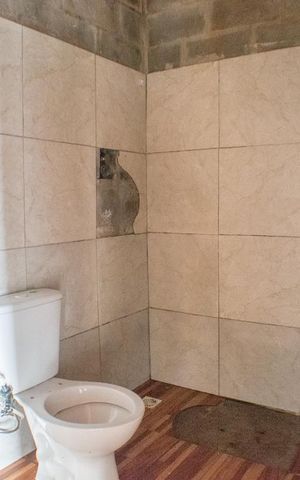 Casa à venda com 50m², 1 quarto e 1 vaga Casa à venda com 50m², 1 quarto e 1 vagaBanheiro