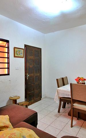 Casa à venda com 83m², 2 quartos e 2 vagasSala
