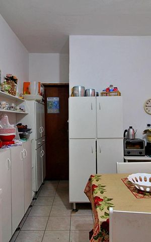 Casa à venda com 83m², 2 quartos e 2 vagasCozinha