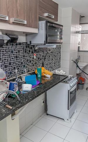 Apartamento à venda com 85m², 3 quartos e 1 vaga Apartamento à venda com 85m², 3 quartos e 1 vagaCozinha e Área de Serviço
