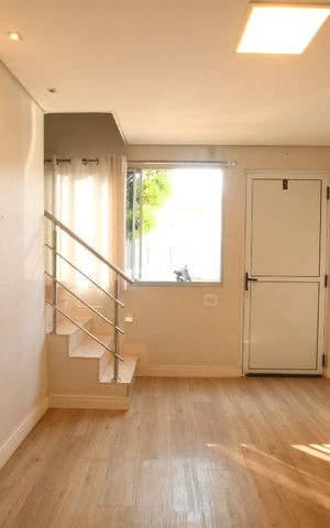 Casa de condomínio à venda com 65m², 2 quartos e 2 vagasSala