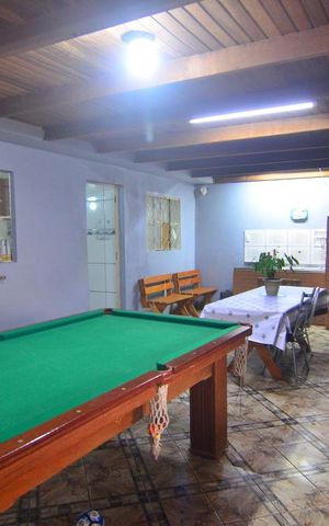 Casa à venda com 250m², 6 quartos e 3 vagasCasa 1 - Varanda