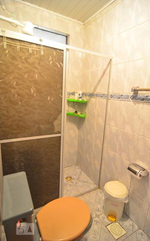 Casa à venda com 250m², 6 quartos e 3 vagasCasa 1 - Banheiro suíte