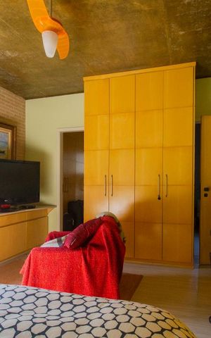 Casa à venda com 240m², 4 quartos e 2 vagasSuíte 1