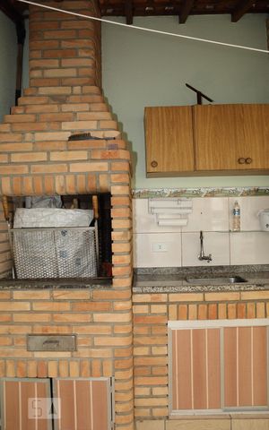 Casa à venda com 244m², 4 quartos e 4 vagasQuintal com Churrasqueira