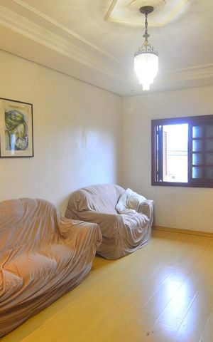 Casa à venda com 176m², 5 quartos e 6 vagasSala