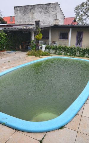 Casa à venda com 176m², 5 quartos e 6 vagasPiscina