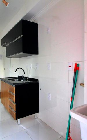Apartamento à venda com 58m², 2 quartos e 1 vagaCozinha e Área de Serviço
