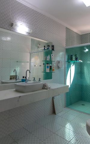 Casa à venda com 180m², 7 quartos e 1 vagaBanheiro Quarto 3 - Suíte
