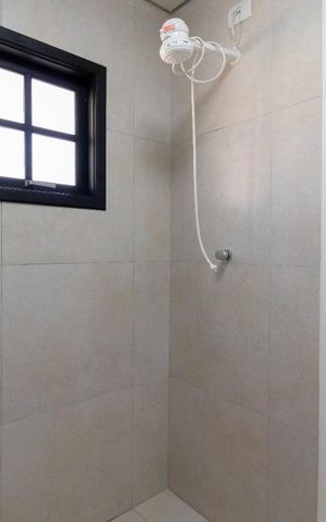 Casa à venda com 220m², 3 quartos e 2 vagas Casa à venda com 220m², 3 quartos e 2 vagasBanheiro da Suíte 3 - Chuveiro Elétrico