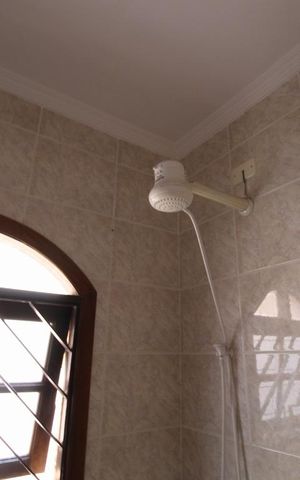 Casa para alugar com 206m², 4 quartos e 5 vagasBanheiro suíte 1