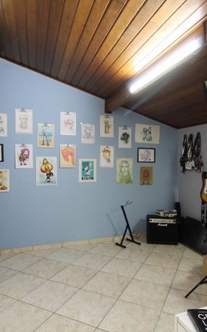 Casa para alugar com 206m², 4 quartos e 5 vagasEscritório 1