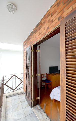 Casa à venda com 200m², 4 quartos e 4 vagas Casa à venda com 200m², 4 quartos e 4 vagasVaranda Quarto 1