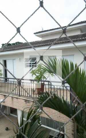 Casa à venda com 378m², 4 quartos e 6 vagas Casa à venda com 378m², 4 quartos e 6 vagasVista da Sala de TV