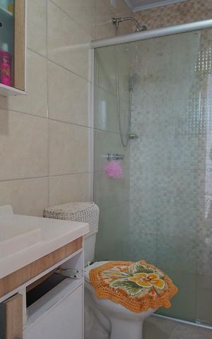 Casa de condomínio à venda com 68m², 2 quartos e 2 vagasBanheiro