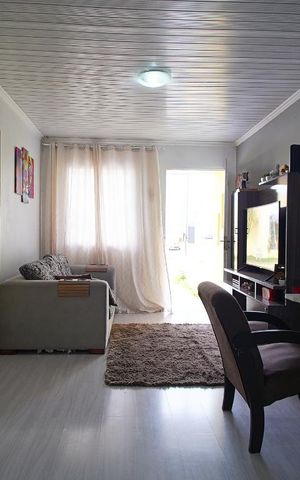 Casa de condomínio à venda com 68m², 2 quartos e 2 vagasSala