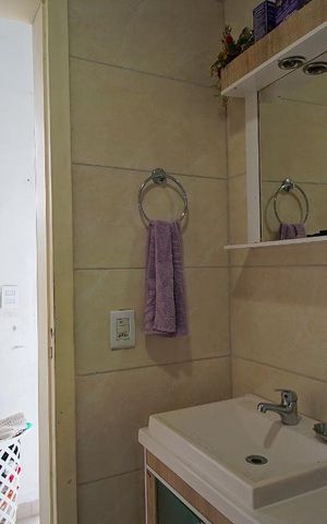 Casa de condomínio à venda com 68m², 2 quartos e 2 vagasBanheiro