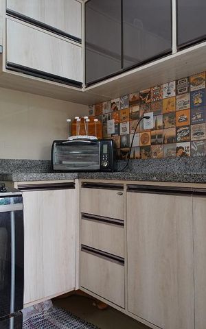 Casa de condomínio à venda com 68m², 2 quartos e 2 vagasCozinha