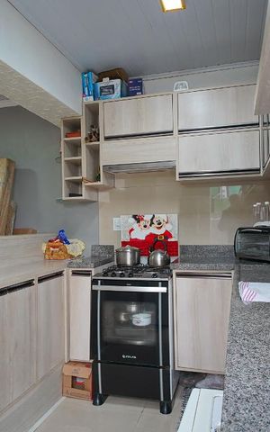 Casa de condomínio à venda com 68m², 2 quartos e 2 vagasCozinha