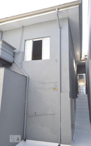 Casa para alugar com 100m², 2 quartos e sem vagaFachada posterior