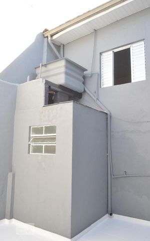 Casa para alugar com 100m², 2 quartos e sem vagaFachada posterior
