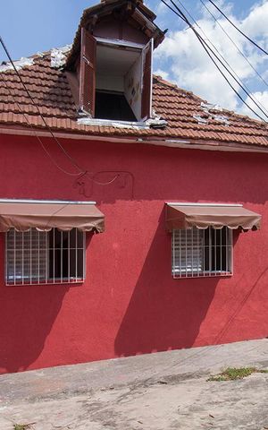 Casa à venda com 48m², 2 quartos e sem vagaFachada e Área externa compartilhada