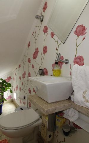 Casa à venda com 180m², 4 quartos e 3 vagasBanheiro