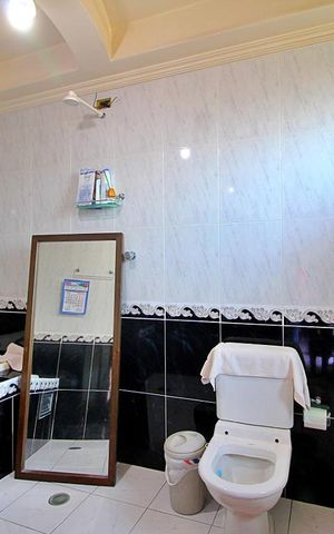 Casa à venda com 394m², 3 quartos e 6 vagasBanheiro da Suíte 1