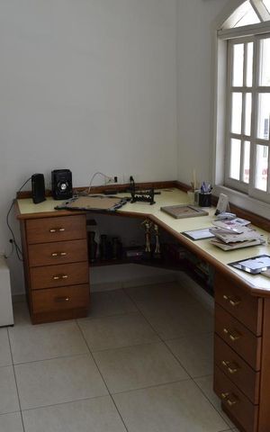 Casa à venda com 575m², 4 quartos e 5 vagasDetalhe Sala