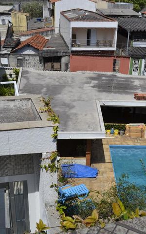 Casa à venda com 575m², 4 quartos e 5 vagasVista da Sacada