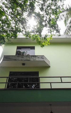 Casa à venda com 636m², 4 quartos e 6 vagas Casa à venda com 636m², 4 quartos e 6 vagasFachada