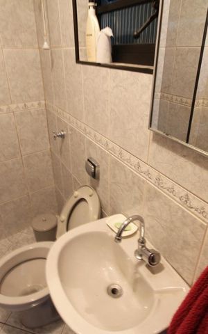 Casa à venda com 435m², 4 quartos e 8 vagasBanheiro da garagem