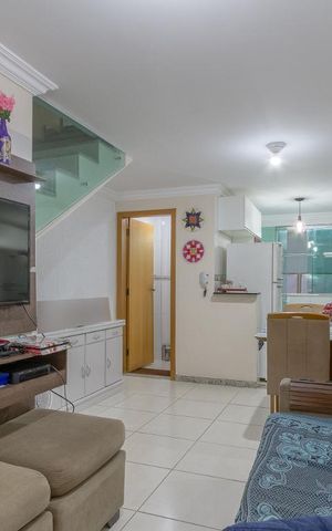 Casa à venda com 65m², 2 quartos e 2 vagas Casa à venda com 65m², 2 quartos e 2 vagasSala