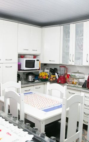 Casa à venda com 50m², 2 quartos e 1 vaga Casa à venda com 50m², 2 quartos e 1 vagaCozinha