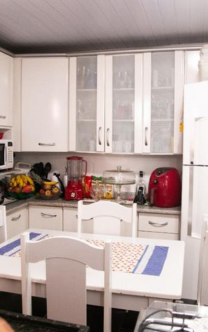 Casa à venda com 50m², 2 quartos e 1 vaga Casa à venda com 50m², 2 quartos e 1 vagaCozinha