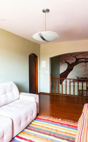 Casa à venda com 287m², 4 quartos e 3 vagasSala de Estar