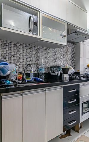Apartamento à venda com 56m², 2 quartos e 1 vaga Apartamento à venda com 56m², 2 quartos e 1 vagaCozinha e Área de Serviço
