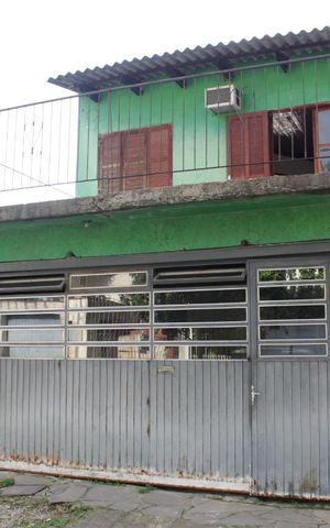 Casa à venda com 498m², 3 quartos e 2 vagas Casa à venda com 498m², 3 quartos e 2 vagasFachada